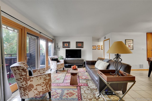 living room featuring light tile patterned floors