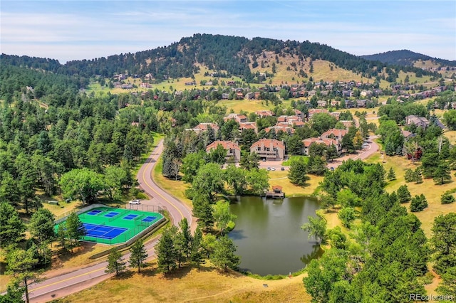 bird's eye view featuring a water and mountain view