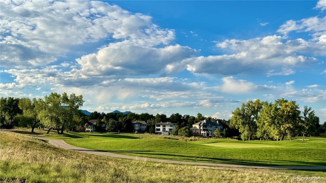 15362 W 66th Ave Unit D, Arvada, CO 80007 - view of community with a lawn and view of golf course