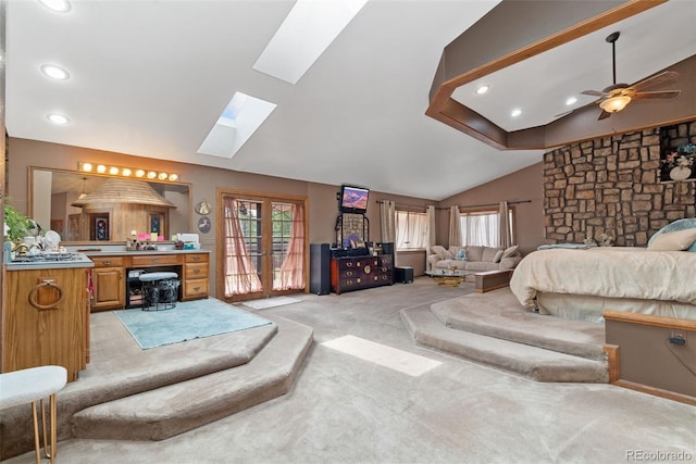 11485 Pecos St, Denver, CO 80234 - bedroom featuring vaulted ceiling, light carpet, a skylight, access to exterior, and recessed lighting