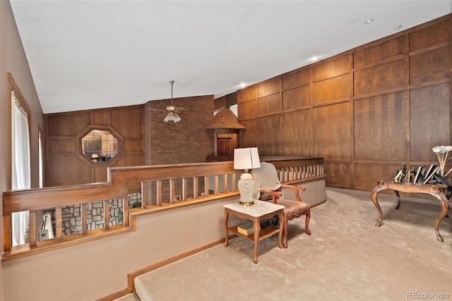 11485 Pecos St, Denver, CO 80234 - sitting room featuring carpet floors and wood walls