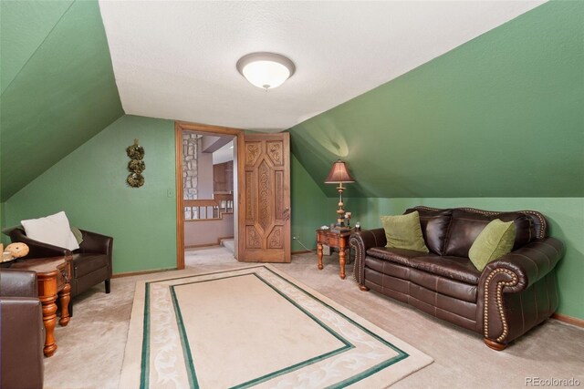 11485 Pecos St, Denver, CO 80234 - carpeted living area featuring vaulted ceiling