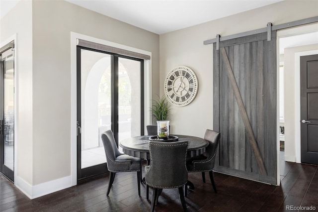 3255 S Birch St, Denver, CO 80222 - dining space featuring dark wood-style floors and a barn door