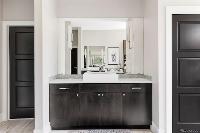 3255 S Birch St, Denver, CO 80222 - bathroom with vanity and baseboards