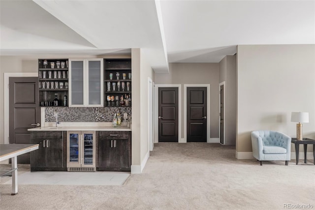 3255 S Birch St, Denver, CO 80222 - indoor bar featuring wine cooler, light carpet, and tasteful backsplash