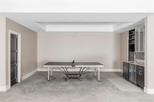 3255 S Birch St, Denver, CO 80222 - recreation room with a tray ceiling, light colored carpet, and beverage cooler