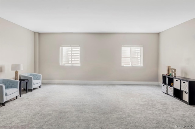 3255 S Birch St, Denver, CO 80222 - living area featuring healthy amount of natural light and carpet floors