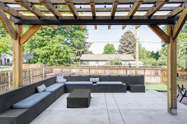 3255 S Birch St, Denver, CO 80222 - fenced backyard with outdoor lounge area, a pergola, and a patio