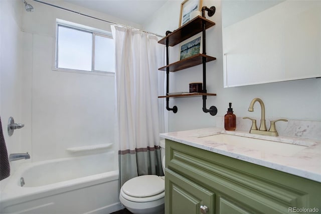 full bath featuring shower / tub combo with curtain, vanity, and toilet