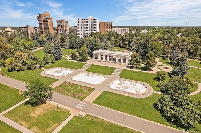 birds eye view of property with a view of city