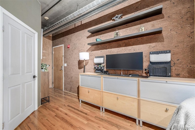 1499 Blake St Unit 4F, Denver, CO 80202 - living area featuring light wood-style flooring