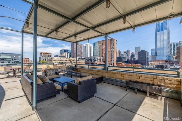 1499 Blake St Unit 4F, Denver, CO 80202 - view of patio / terrace featuring a skyline view and an outdoor hangout area