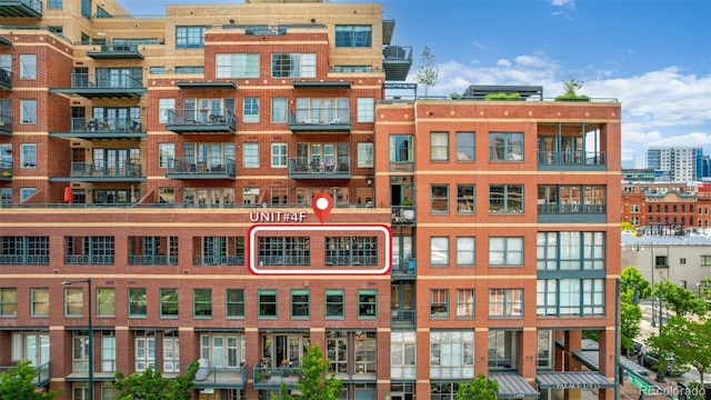 1499 Blake St Unit 4F, Denver, CO 80202 - view of apartment building / complex