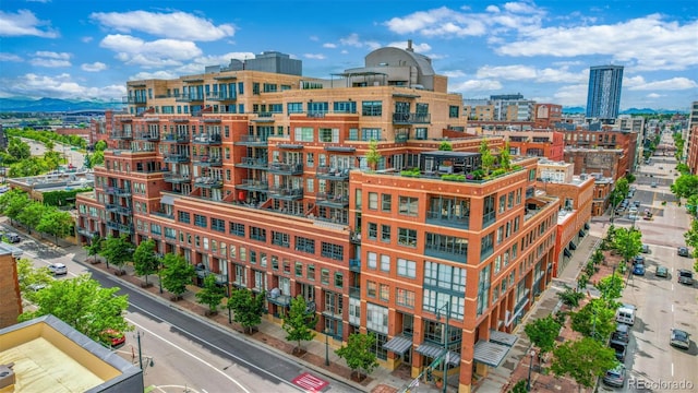 1499 Blake St Unit 4F, Denver, CO 80202 - view of apartment building / complex featuring a city view