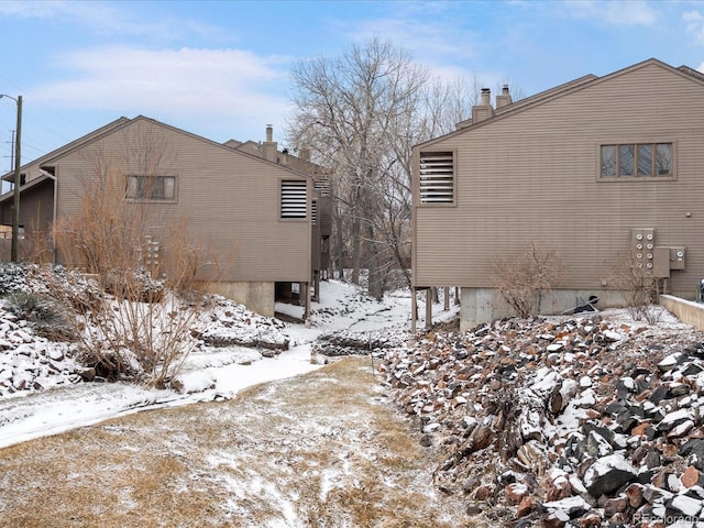 view of snow covered property