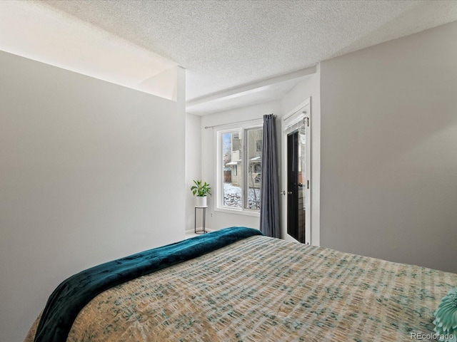 bedroom with a textured ceiling