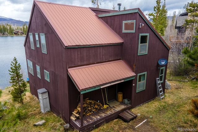 527 Gcr 494, Grand Lake, CO 80447 - back of property featuring metal roof and a water and mountain view