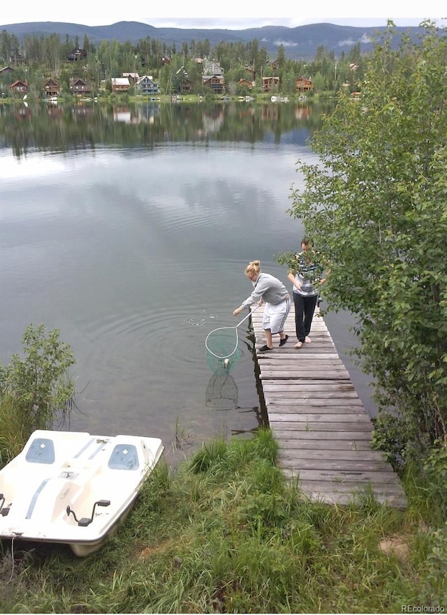 527 Gcr 494, Grand Lake, CO 80447 - dock area with a water and mountain view