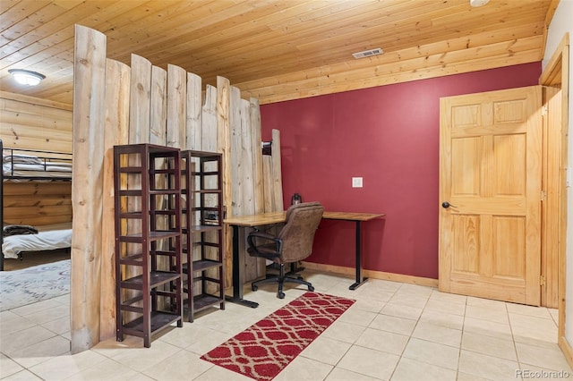 office area with wooden ceiling, tile patterned floors, and rustic walls