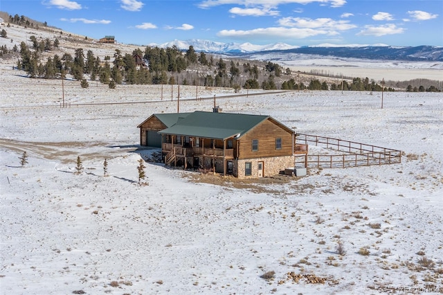 exterior space featuring a mountain view and a rural view