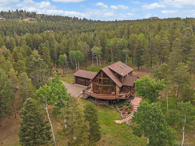 13094 Molly Dr, Conifer, CO 80433 - aerial view of property and surrounding area with a heavily wooded area