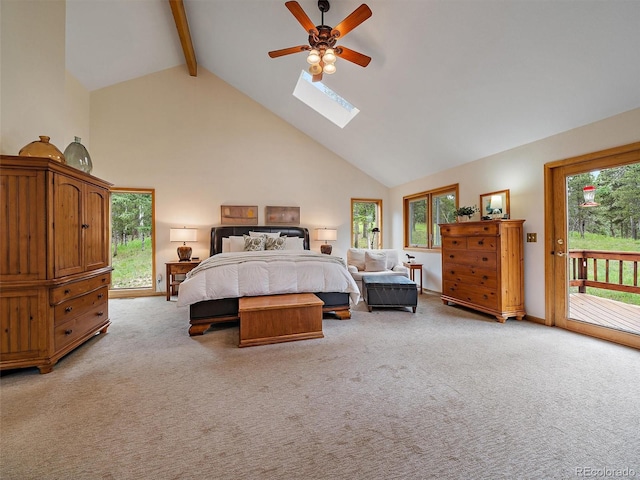 13094 Molly Dr, Conifer, CO 80433 - bedroom with access to exterior, high vaulted ceiling, light colored carpet, a skylight, and beamed ceiling