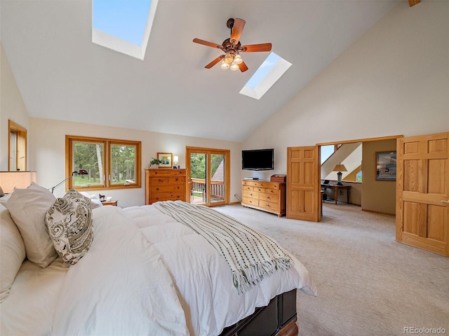 13094 Molly Dr, Conifer, CO 80433 - bedroom featuring a skylight, high vaulted ceiling, access to outside, light colored carpet, and ceiling fan