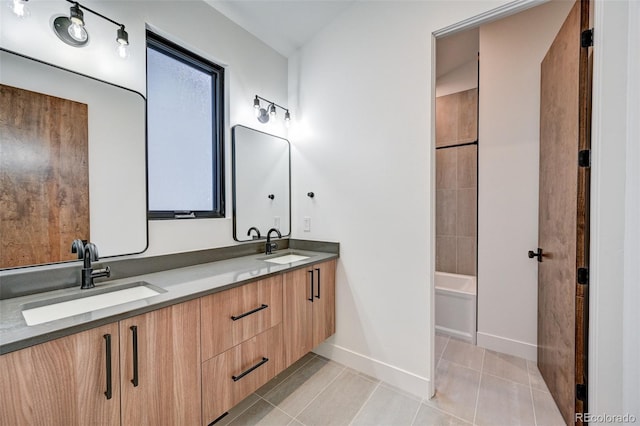 bathroom with vanity, tile patterned floors, and shower / bathing tub combination