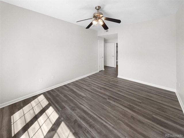 empty room featuring hardwood / wood-style flooring and ceiling fan