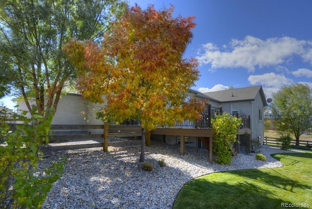 698 Larimer Creek Dr, Monument, CO 80132 - view of green lawn with a deck