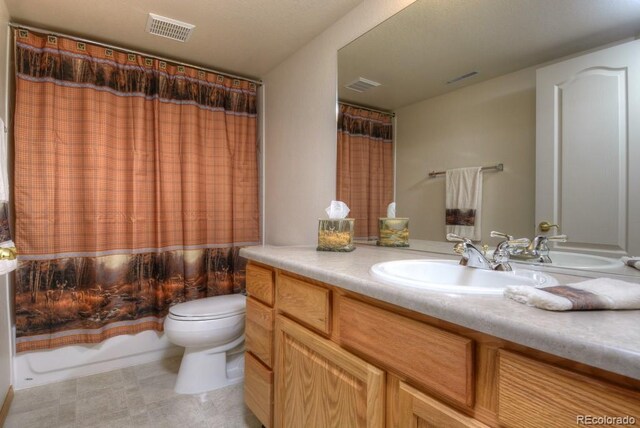 698 Larimer Creek Dr, Monument, CO 80132 - bathroom with toilet, vanity, and a shower with curtain
