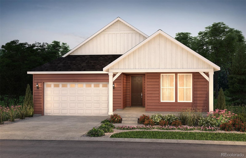 view of front of property with driveway, an attached garage, and board and batten siding