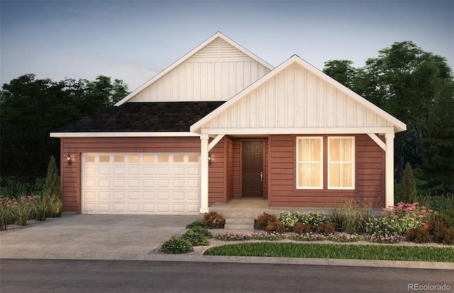 view of front of property with driveway, an attached garage, and board and batten siding