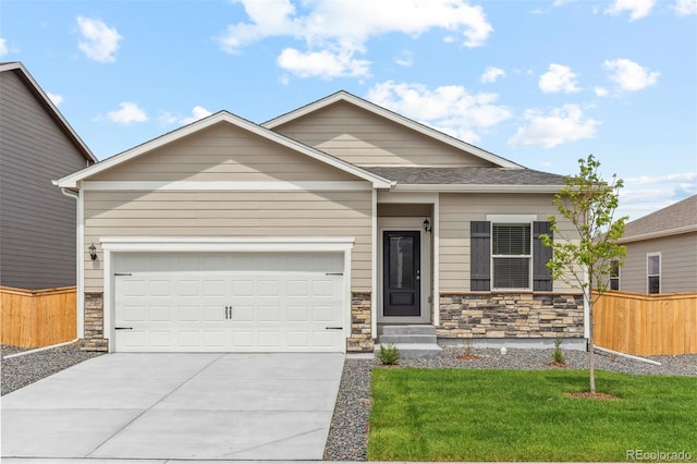 view of front facade with a front lawn and a garage