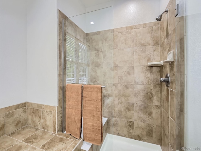14310 Kalamath St, Westminster, CO 80023 - full bathroom featuring tiled shower