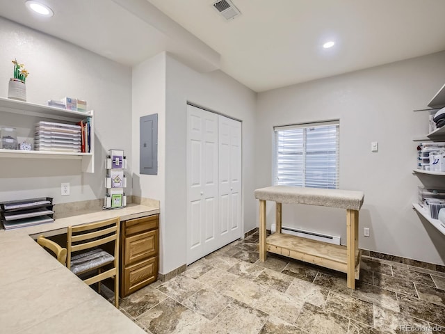 14310 Kalamath St, Westminster, CO 80023 - office space featuring electric panel, a baseboard heating unit, stone tile floors, and recessed lighting