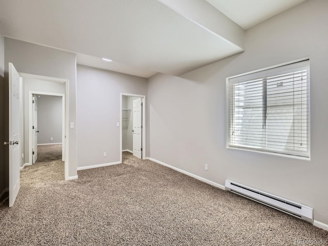 14310 Kalamath St, Westminster, CO 80023 - unfurnished bedroom with a baseboard radiator and carpet flooring