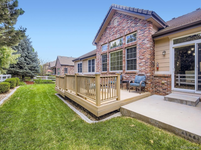 14310 Kalamath St, Westminster, CO 80023 - wooden deck with a yard and a patio
