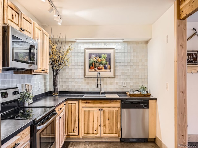 kitchen featuring appliances with stainless steel finishes and sink