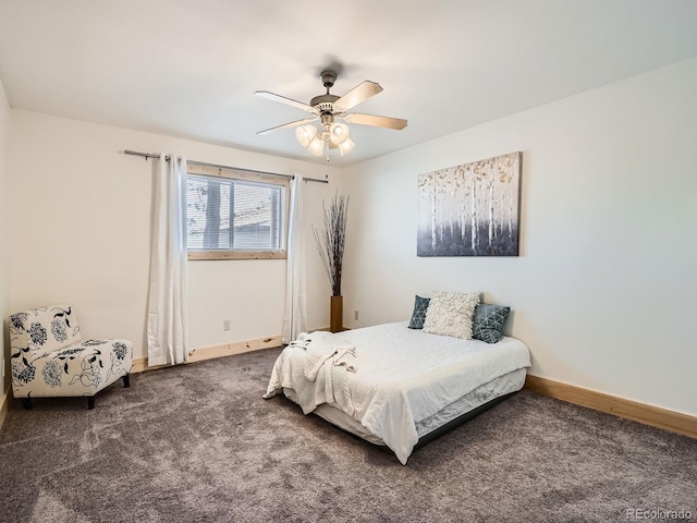 bedroom featuring dark carpet and ceiling fan