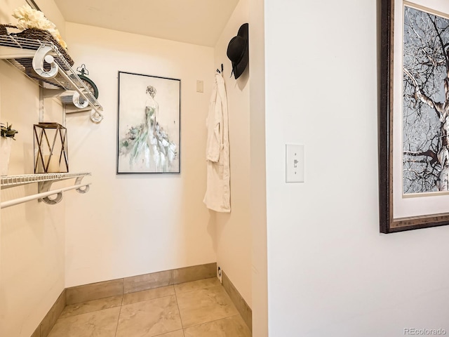 bathroom with tile patterned floors