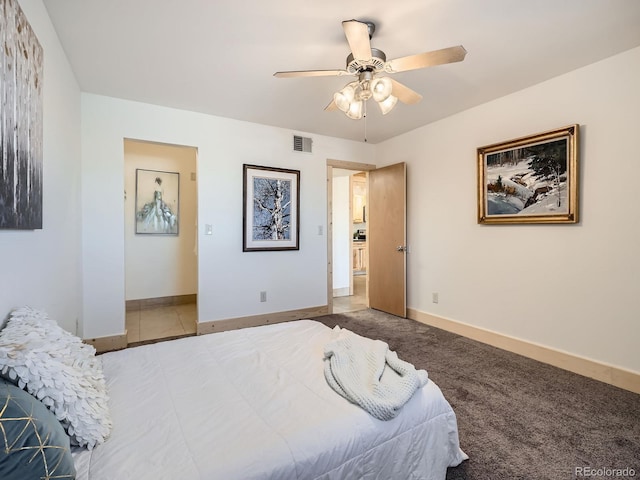 400 Zang St Unit 1-105, Lakewood, CO 80228 - bedroom with baseboards and ceiling fan