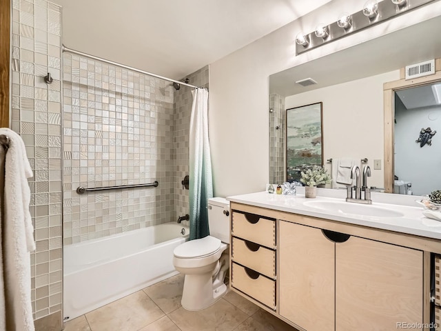 400 Zang St Unit 1-105, Lakewood, CO 80228 - full bath with toilet, shower / bathtub combination with curtain, vanity, and tile patterned floors