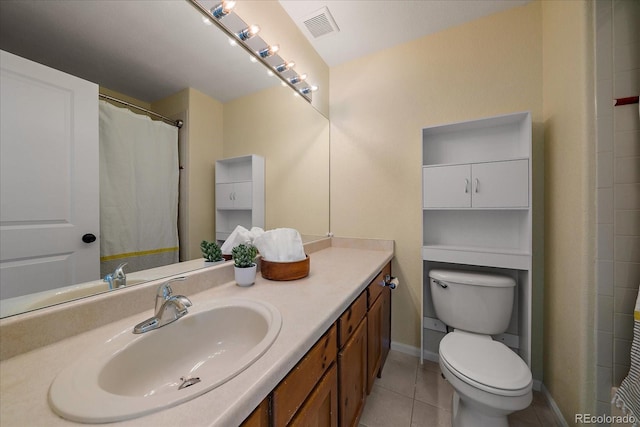 bathroom with walk in shower, toilet, tile patterned floors, and vanity