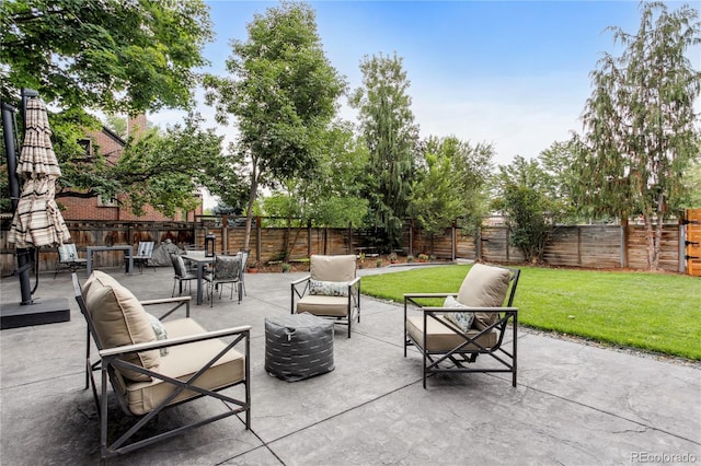 2143 S Downing St, Denver, CO 80210 - fenced backyard with an outdoor hangout area and a patio
