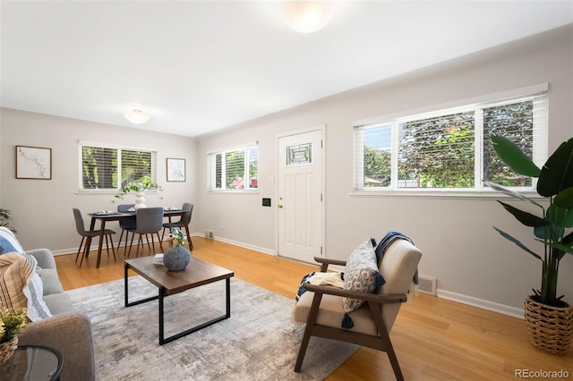 2900 Krameria St, Denver, CO 80207 - living area with light wood finished floors and baseboards