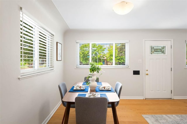 2900 Krameria St, Denver, CO 80207 - dining room featuring plenty of natural light and light wood-style floors