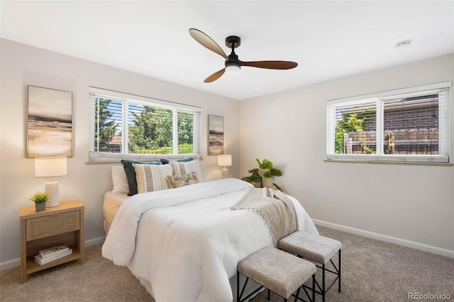 2900 Krameria St, Denver, CO 80207 - carpeted bedroom with baseboards and a ceiling fan
