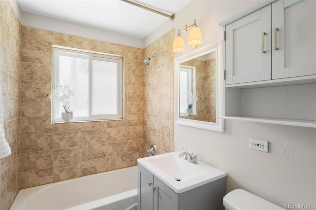 2900 Krameria St, Denver, CO 80207 - bathroom featuring vanity, shower / washtub combination, and healthy amount of natural light