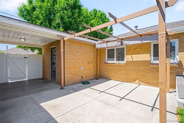 2900 Krameria St, Denver, CO 80207 - view of patio featuring a gate